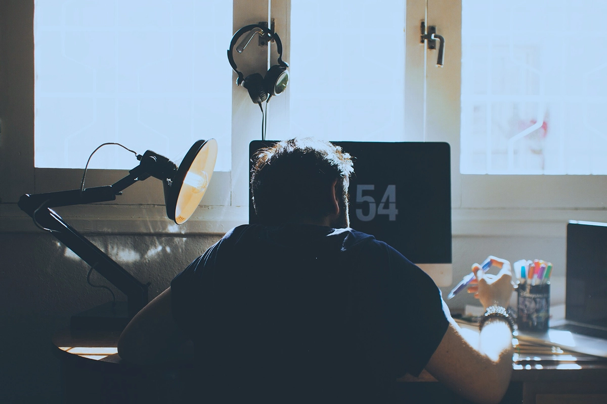 Remote worker at home using practical remote work tips to stay focused